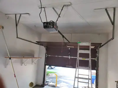 Garage interior painting and shelving — photo 1 of 4